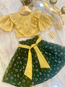 Gold and Green Lantern - Ruffle and cold shouldered top with paper bag skirt