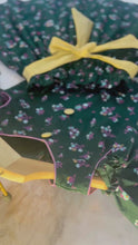 Load and play video in Gallery viewer, Gold and Green Lantern - Ruffle and cold shouldered top with paper bag skirt
